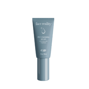A sleek tube of face cream labeled 'face reality'.