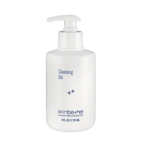 White bottle of cleansing gel with a pump dispenser.