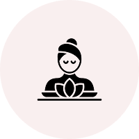 Group 4 (1) Icon of a person meditating with a lotus flower in front, set against a light pink circular background.
