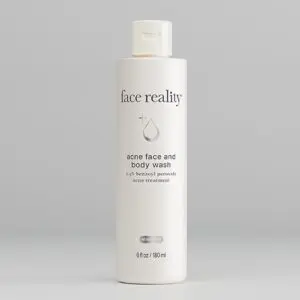 A white bottle of Face Reality gentle face and body wash.