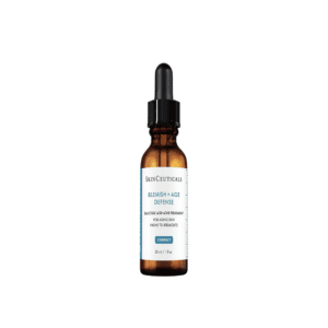 Amber glass dropper bottle labeled "Niacinamide 10% + Zinc 1% Serum" for skincare.