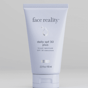 Face Reality daily SPF 30 sunscreen in a white tube.