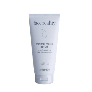 Tube of Face Reality mineral matte SPF 25 cream on white background.