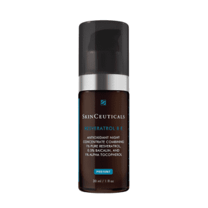 A dark brown bottle of SkinCeuticals antioxidant serum with a black cap.